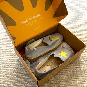 Light blue flat espadrilles. Soludos’ “Smoking Slipper”.